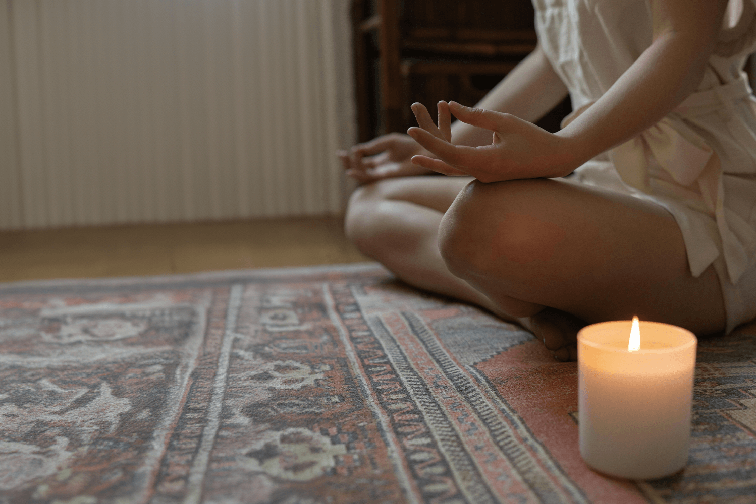 meditating-with-a-candle-before-bedtime