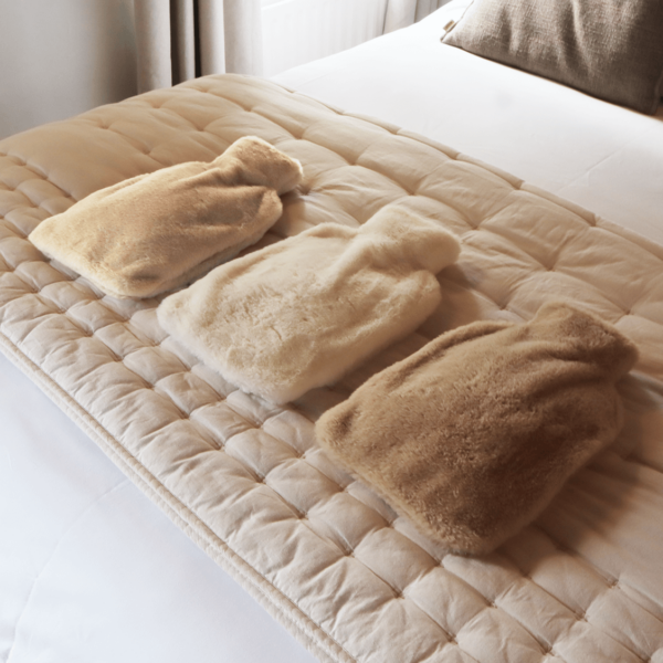 Pouchy-Faux-Fur-Hot-Water-Bottles-on-bed-square