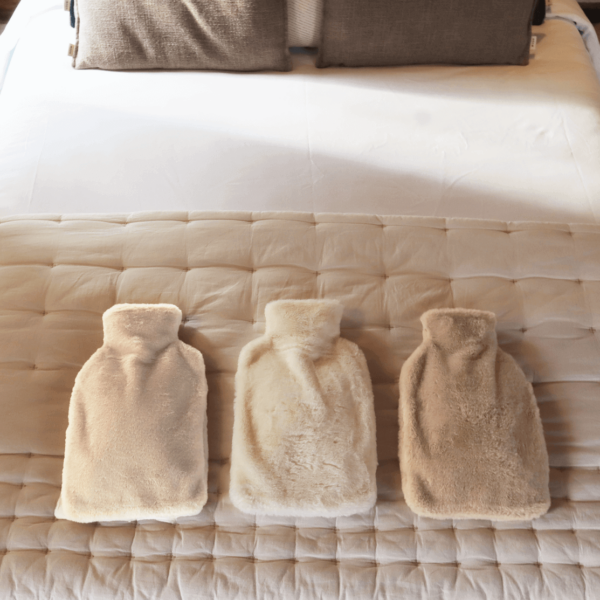 Pouchy-Faux-Fur-Hot-Water-Bottles-on-the-bed-together-square-newest