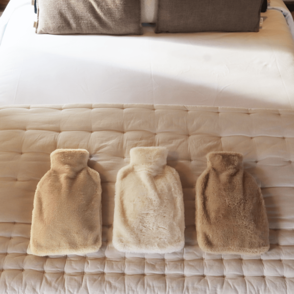 Pouchy-Faux-Fur-Hot-Water-Bottles-on-bed-together-square